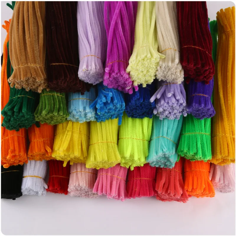 Rows of pipe cleaner bundles in rainbow colors
