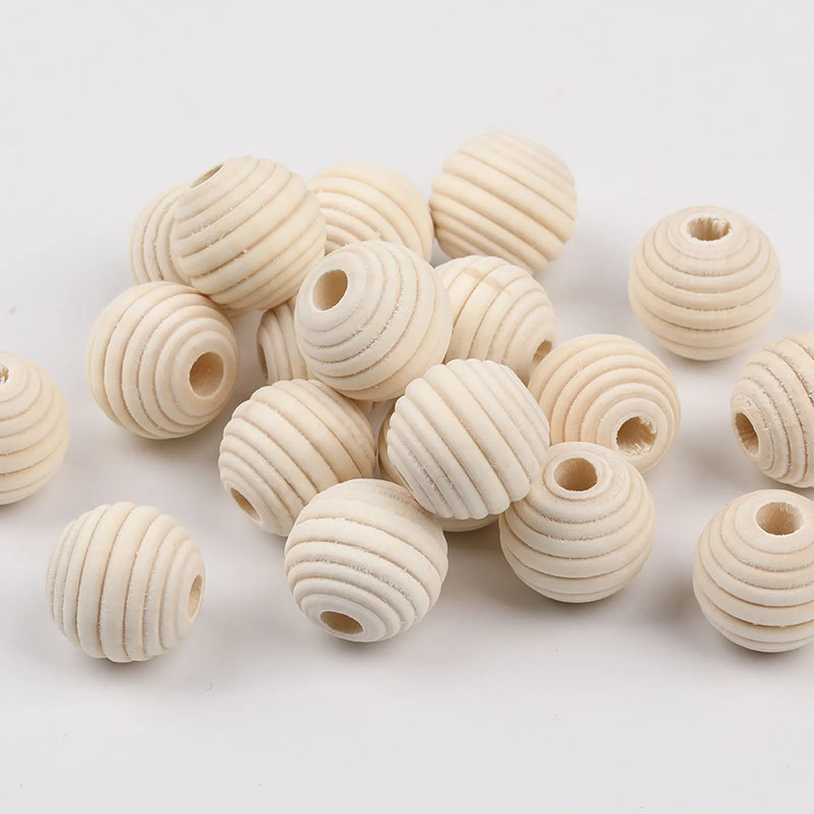 Pile of unfinished ribbed wood beads