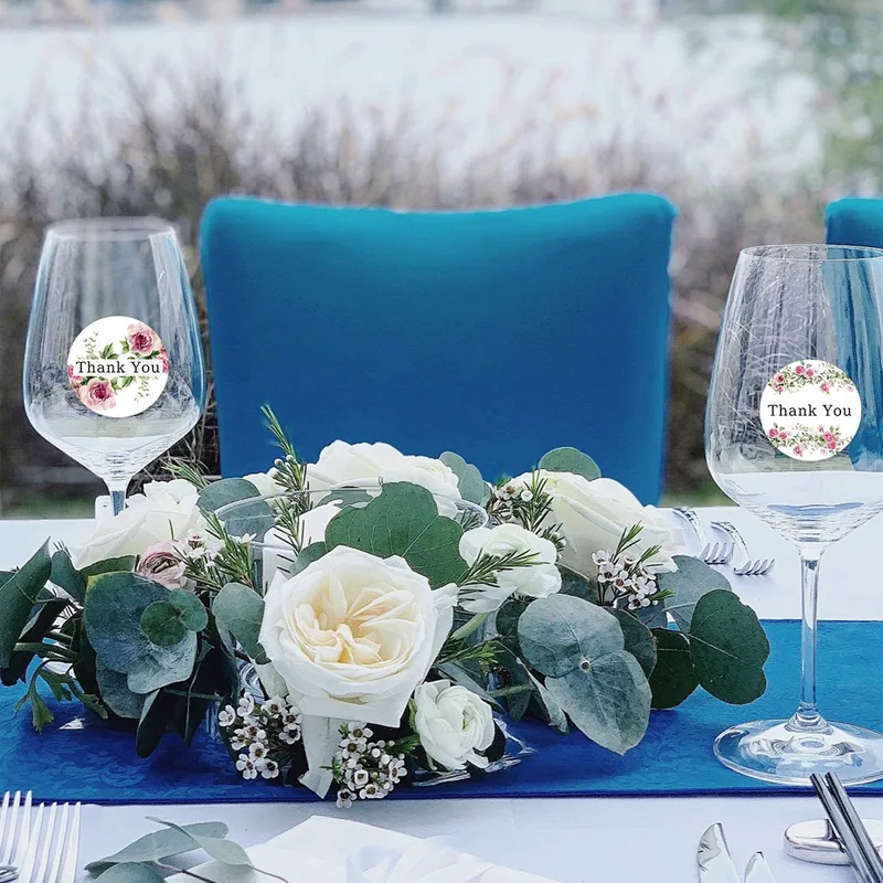 Floral Thank You stickers on wine glasses