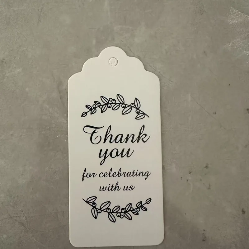 White hang tag printed Thank you for celebrating with us