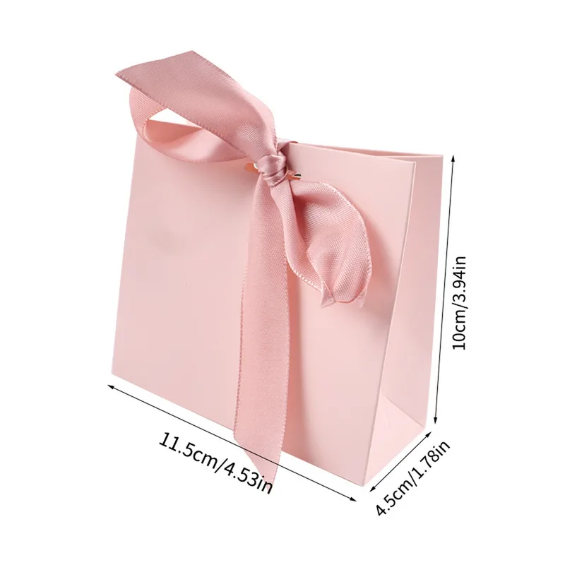 Pink mini gift bag with ribbon and dimensions 11.5 x 10 x 4.5 cm