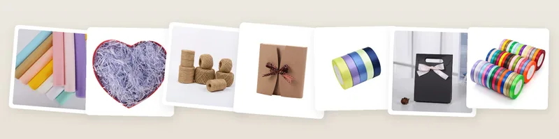 Christmas picks: tissue paper sheets, crinkle-cut paper shred filler, jute twine and kraft gift boxes with ribbon bow